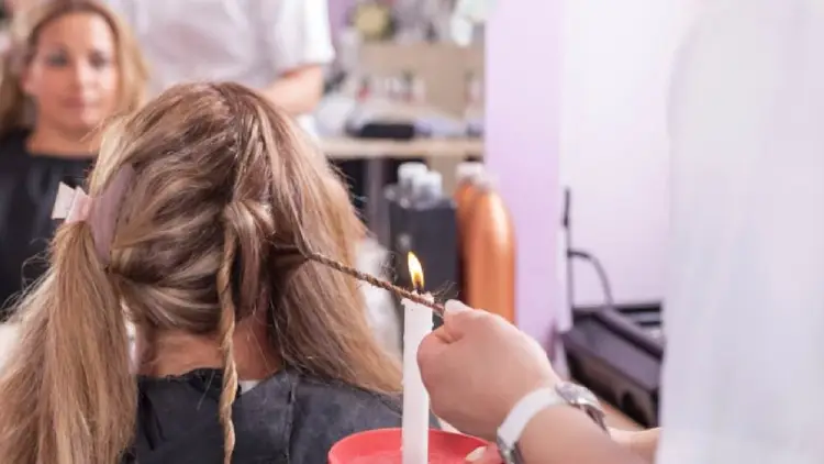 Thinking about burning off your split ends? Find out if candle cuts are safe for your hair