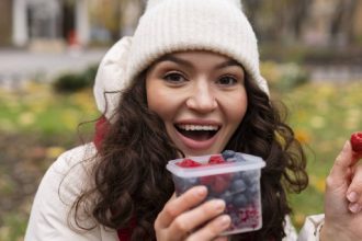 A girl eating berries