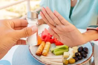 Woman saying no to table salt