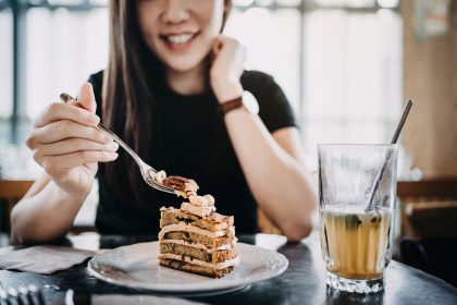 Woman eating cake
