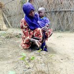 A US-funded nutrition program helped keep this woman's baby alive. A few days after the program was cut, he passed away.