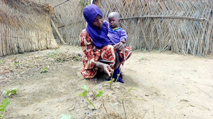 A US-funded nutrition program helped keep this woman's baby alive. A few days after the program was cut, he passed away.